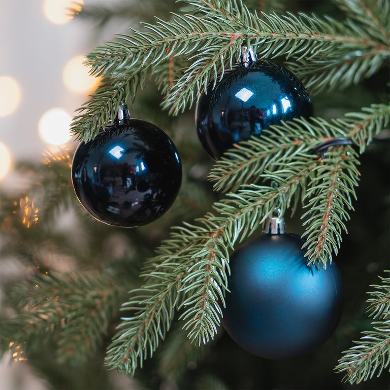 Dark blue Christmas baubles in convenient box