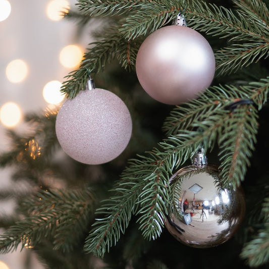 Pink Christmas baubles in convenient box